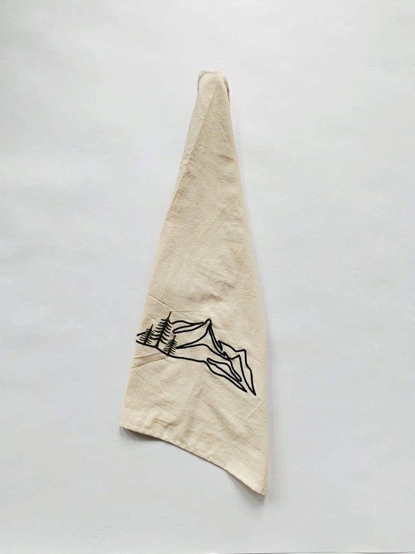 Kjøkkenhåndkle med brodert motiv .
