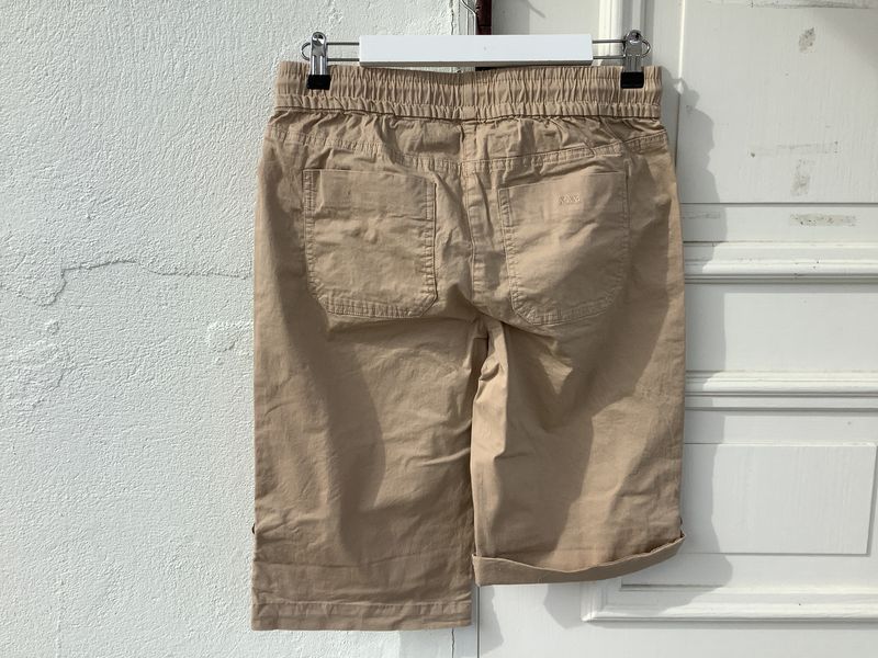 City shorts, sand